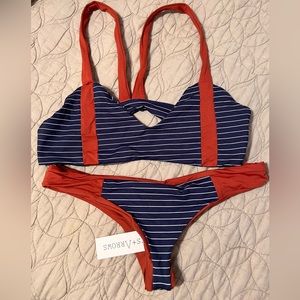 Boys + Arrows Bikini. Top is XL and bottoms are M. Navy & Dark red color.